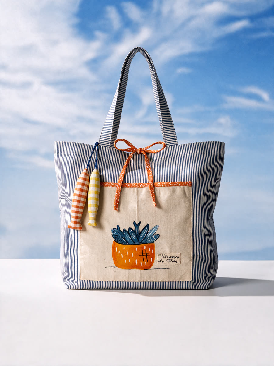 Bolsa O Cardume: peixes azuis dentro de um vaso laranja